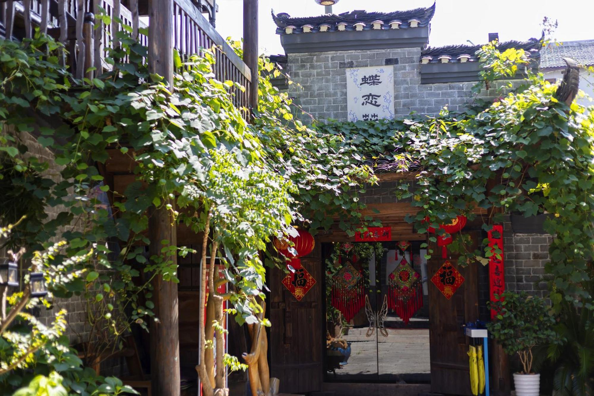 Butterfly Flowers Inn Zhangjiajie Exterior foto